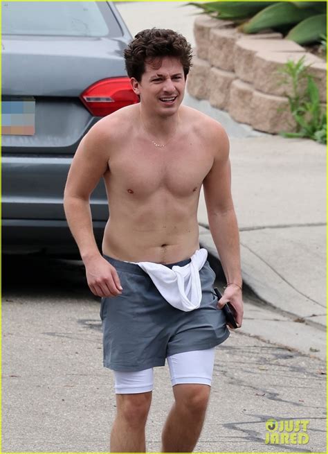 Charlie Puth goes shirtless during post